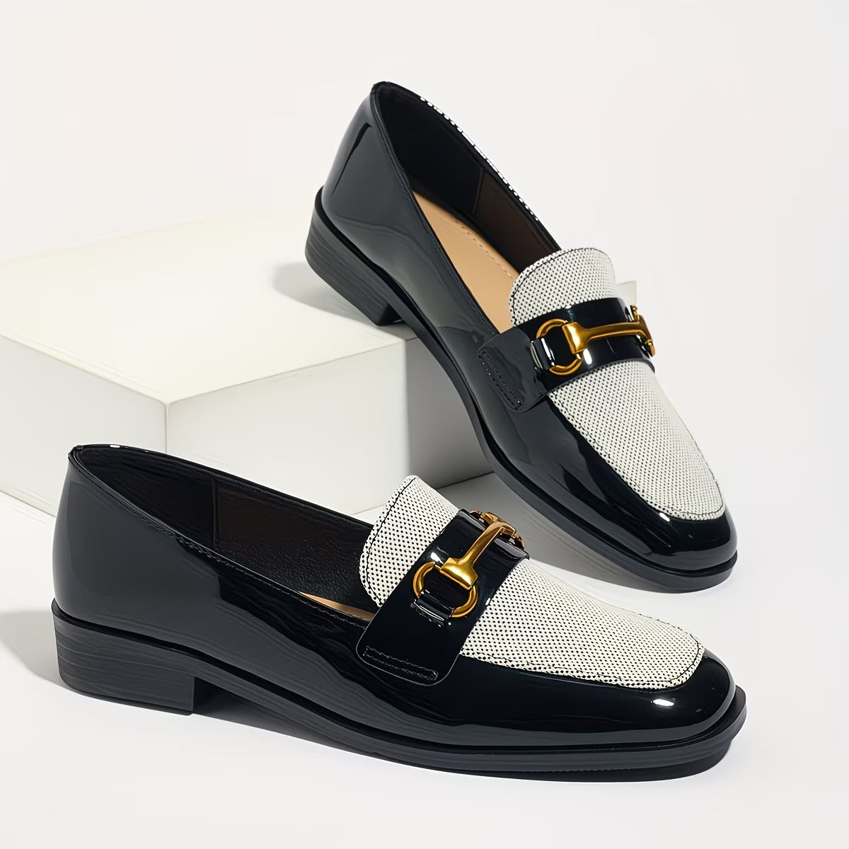 An Elegant Pair of Women's Square-toed Metal Horsebit Blocked